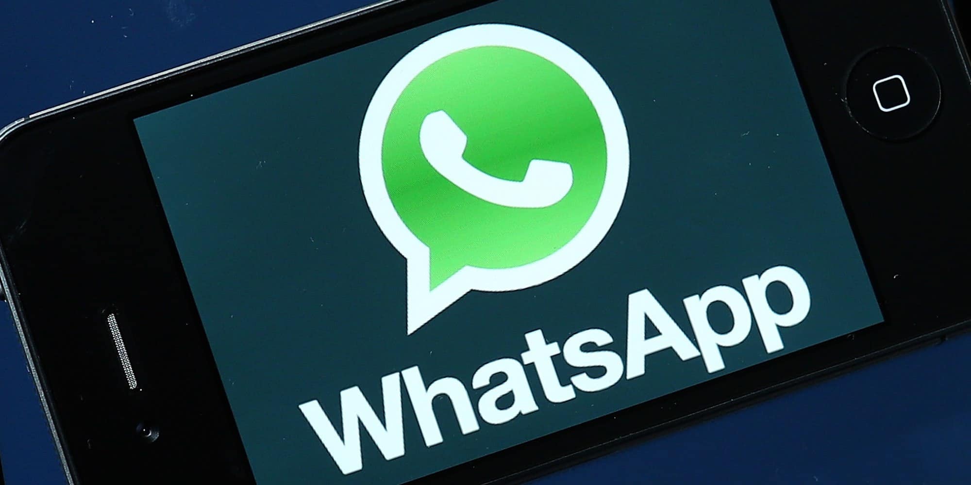 SAN FRANCISCO, CA - FEBRUARY 19: Facebook and WhatsApp logos are displayed on portable electronic devices on February 19, 2014 in San Francisco City. Facebook Inc. announced that it will purchase smartphone-messaging app company WhatsApp Inc. for $19 billion in cash and stock. (Photo Illustration by Justin Sullivan/Getty Images)